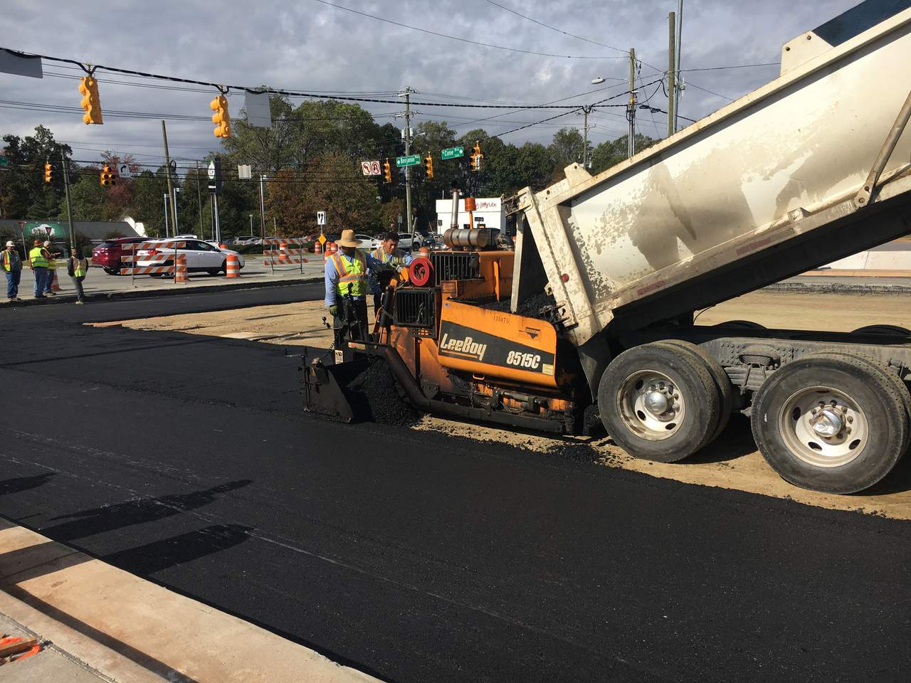Perry Asphalt crew paving a City of Greensboro intersection