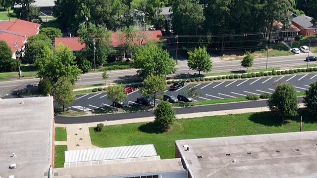 Freshly striped parking stalls on new asphalt
